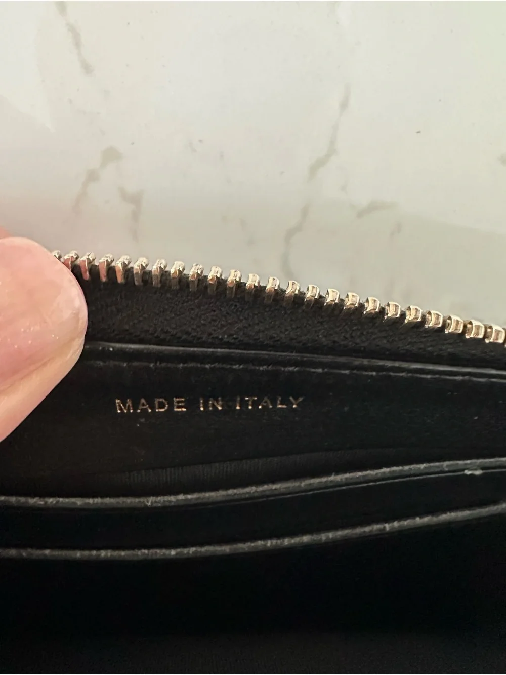 CHANEL Black Quilted Caviar Leather Zip Wallet with Gold Accents